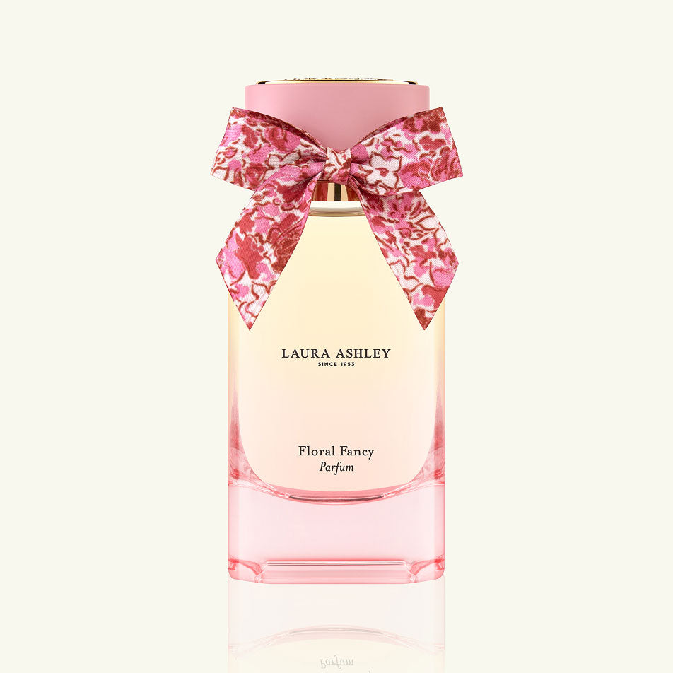 Laura Ashley Floral Fancy perfume bottle with a pink bow on a white background