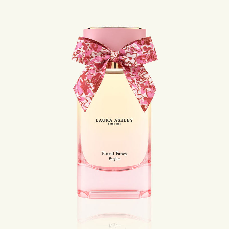 Laura Ashley Floral Fancy perfume bottle with a pink bow on a white background
