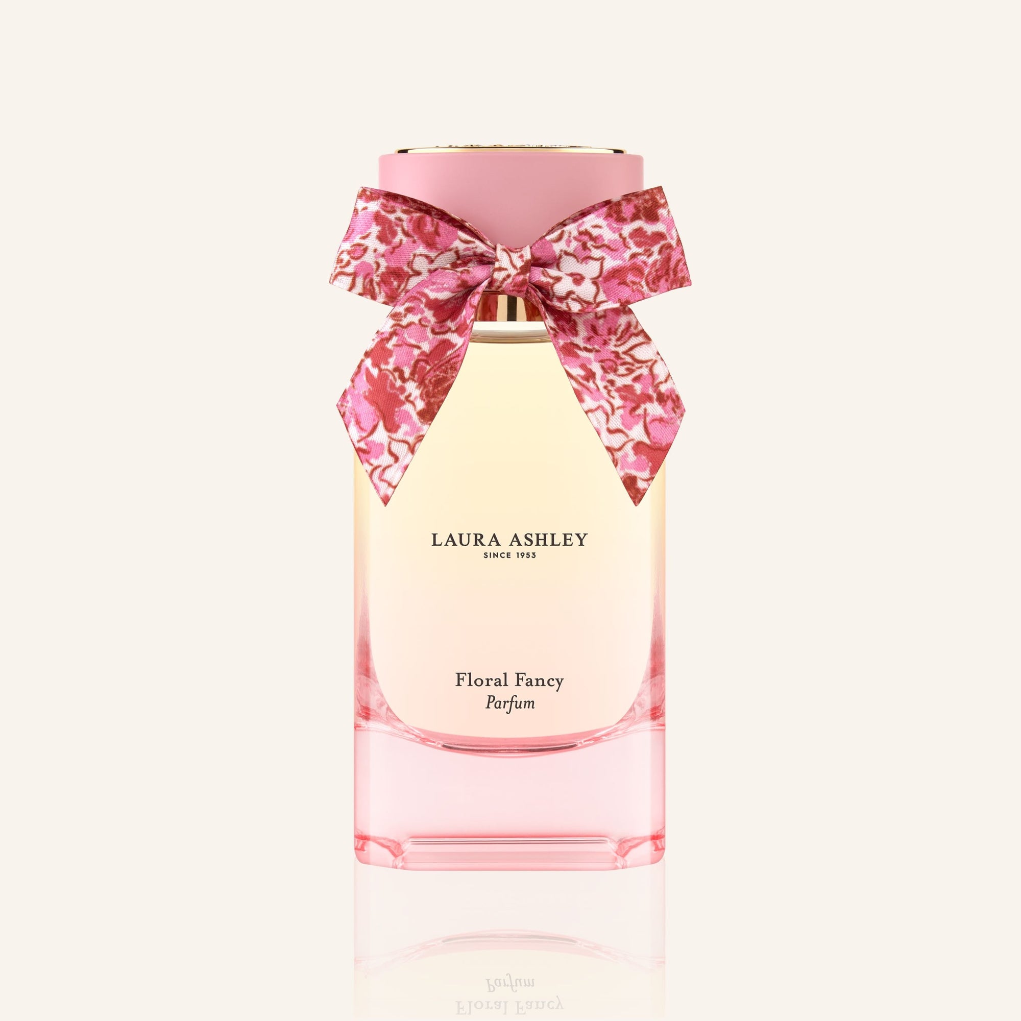 Laura Ashley Floral Fancy perfume bottle with a pink bow on a white background
