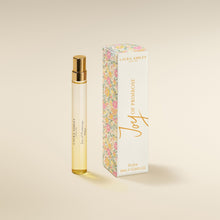 Laura Ashley 'oy of Primrose perfume bottle and packaging on a beige background