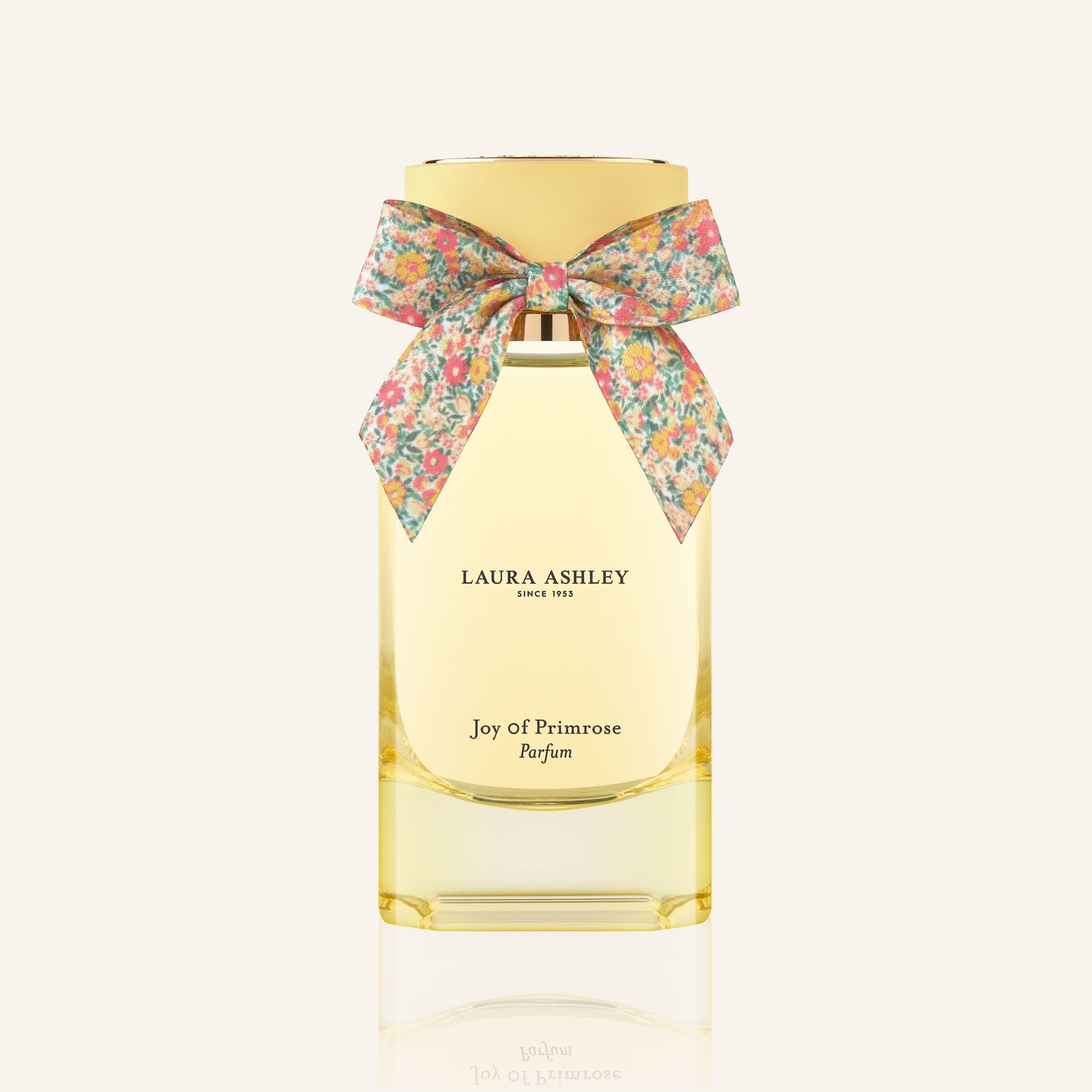 Laura Ashley perfume bottle with a floral bow on a white background