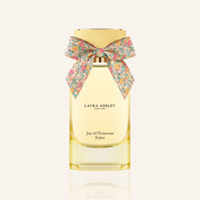 Laura Ashley perfume bottle with a floral bow on a white background