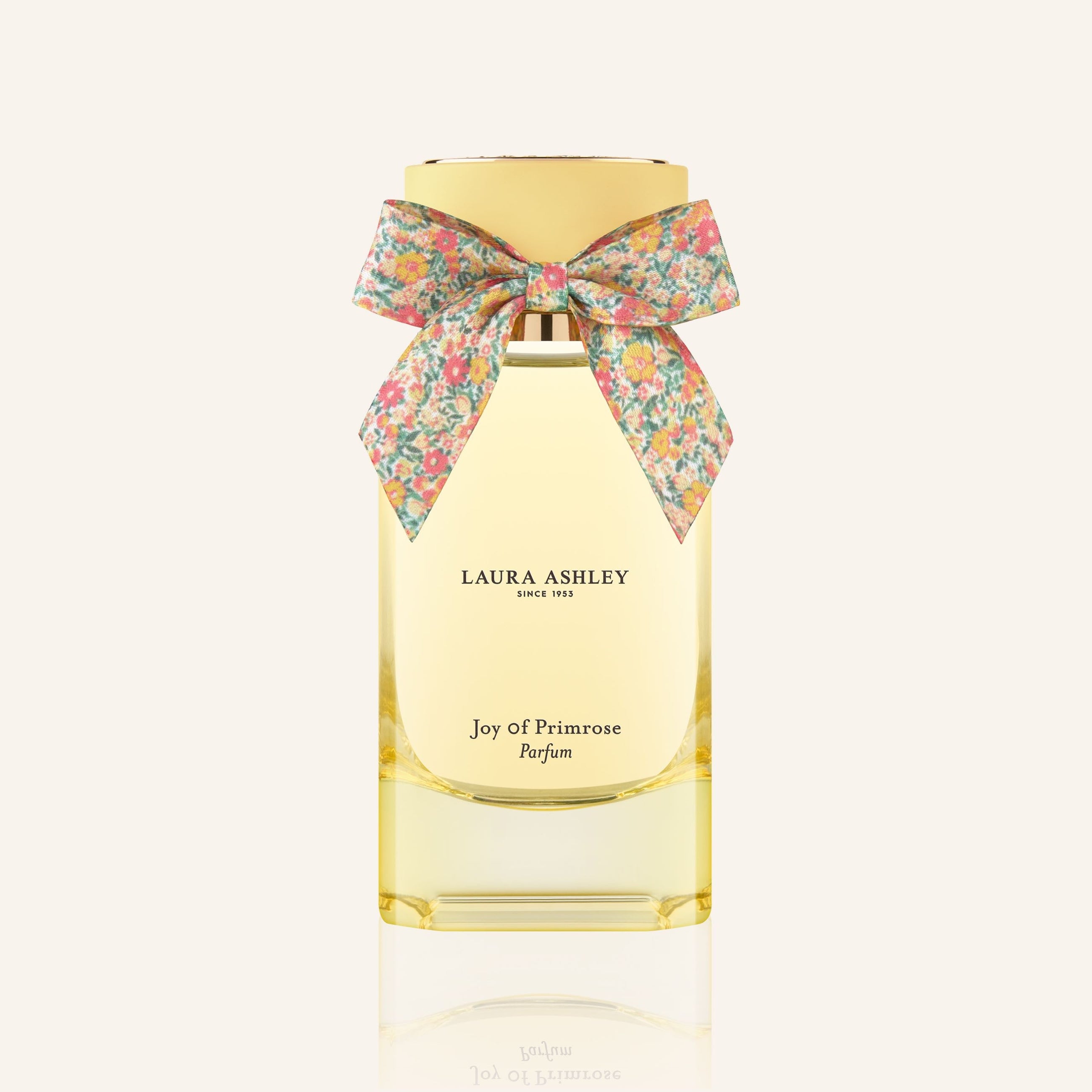 Laura Ashley perfume bottle with a floral bow on a white background