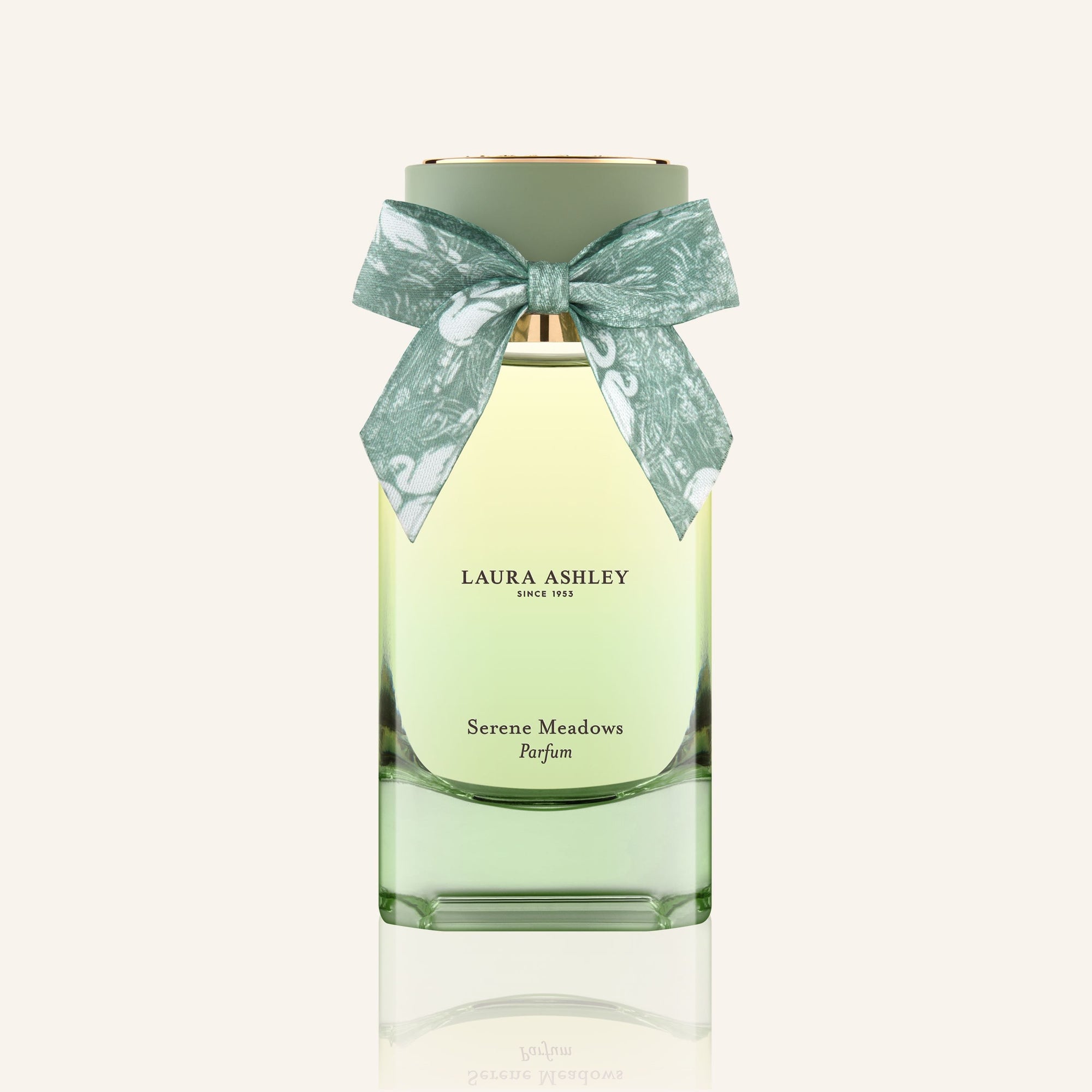 Laura Ashley Serene Meadows perfume bottle with a bow on a white background