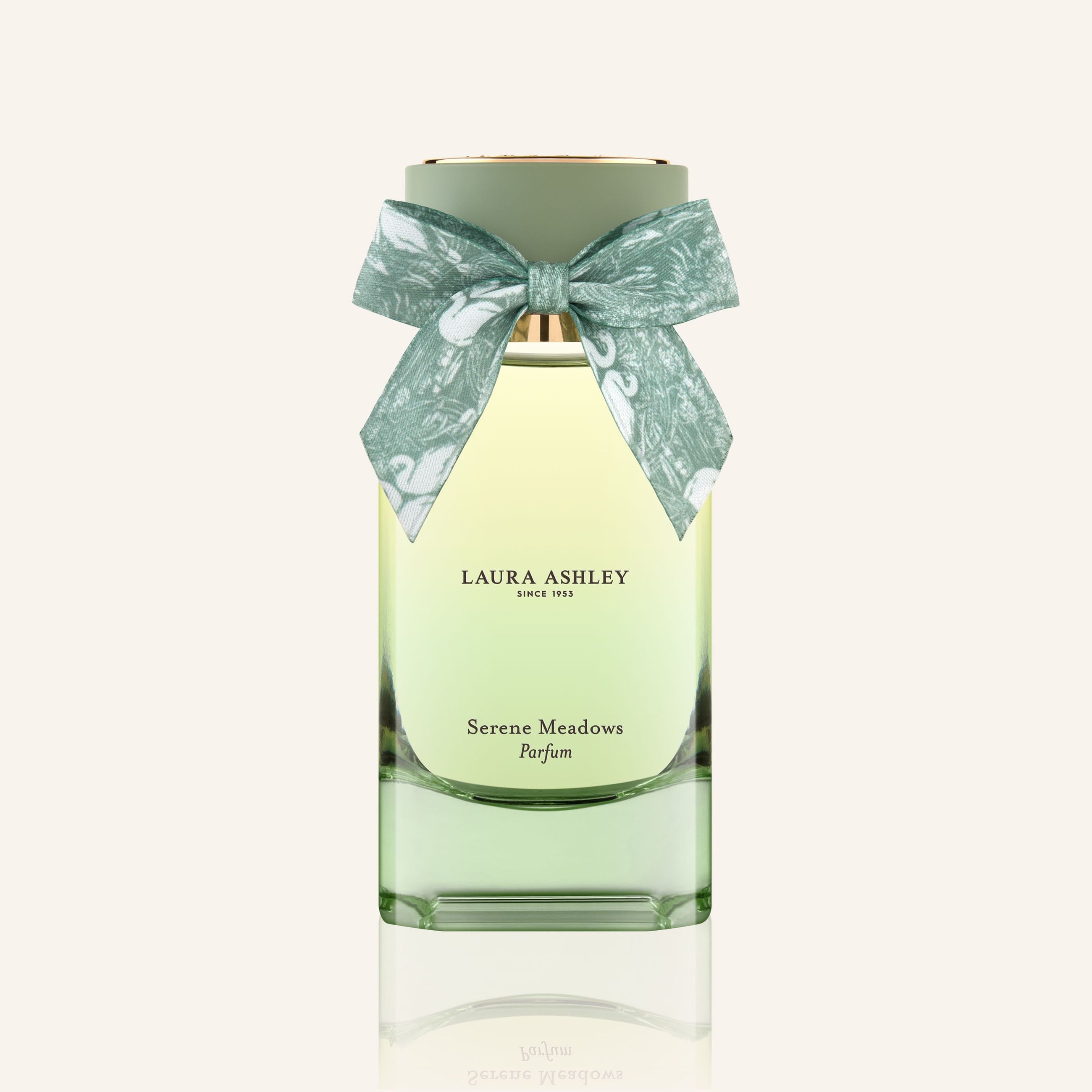 Laura Ashley Serene Meadows perfume bottle with a bow on a white background