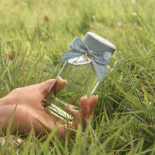 Serene Meadows Fragrance by Laura Ashley parfum bottle held in hand